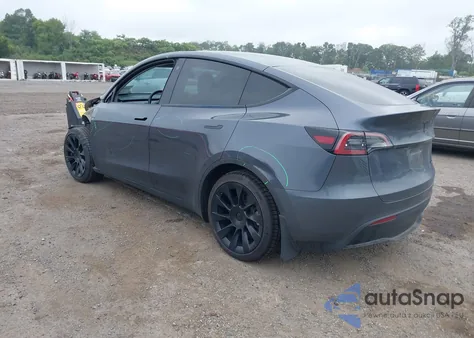 2023 Tesla Model Y Awd/Long Range Dual Motor All-Wheel Drive z USA, uszkodzony, nr VIN 7SAYGDEE3PF696104